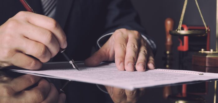 Attorney in suit working in office